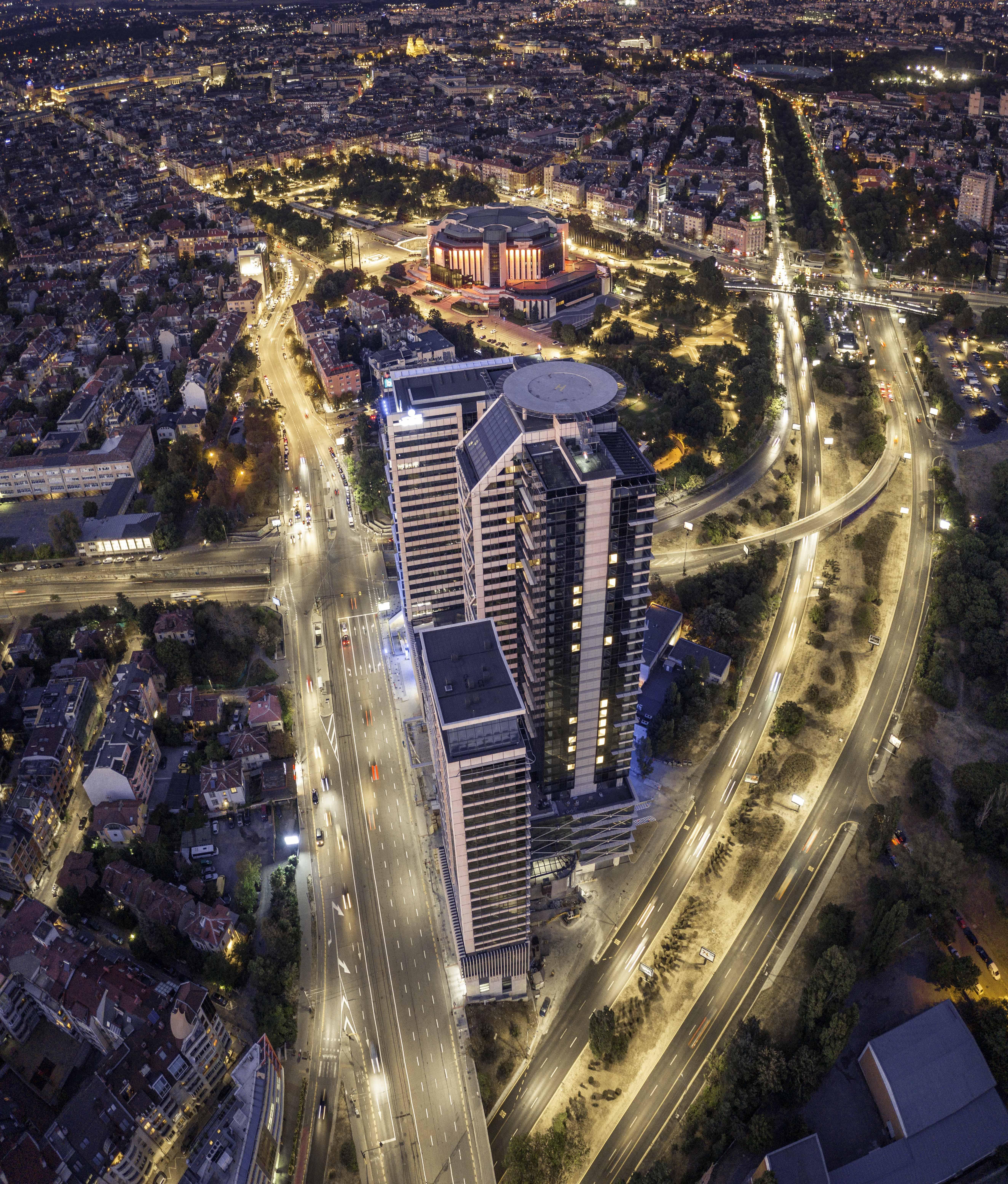 Grand Hotel Millennium Sofia Bagian luar foto Aerial view of the complex at night